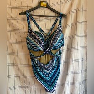 Plus size one piece suit with cut outs